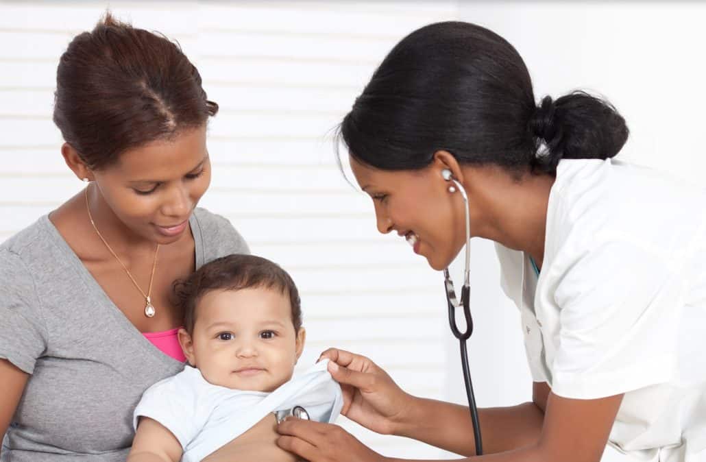 Stock Photo of Happy Family/Doctor Visit